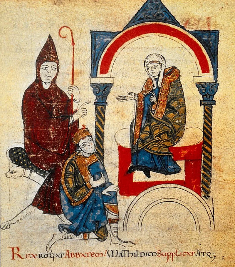 Mathilde de Tuscia e Hugo de Cluny como advogados de Henrique IV. A legenda diz: "O rei faz um pedido ao abade e humildemente se ajoelha diante de Mathilde." ( Rex Rogat abbatem Mathildim supplicat atque. ) (Vita Mathildis des Donizo, por volta de 1115) . . Cidade do Vaticano, Bibliotheca Apostolica Vaticana, Ms. Vat. lat. 4922, fol. 49v)